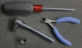 screwdriver, sockets and side cutters image